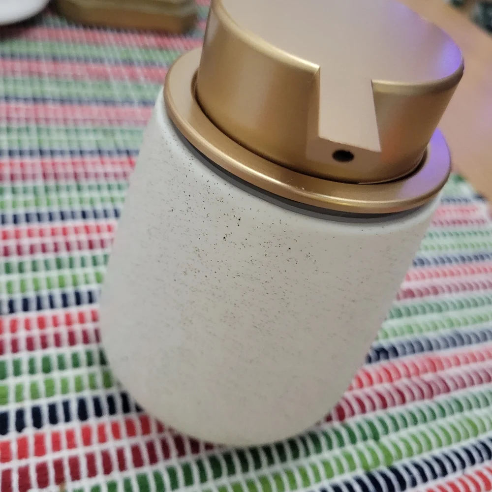 Hand soap dispenser